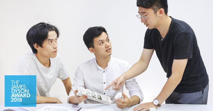 Image of China national winner team looking at their prototype