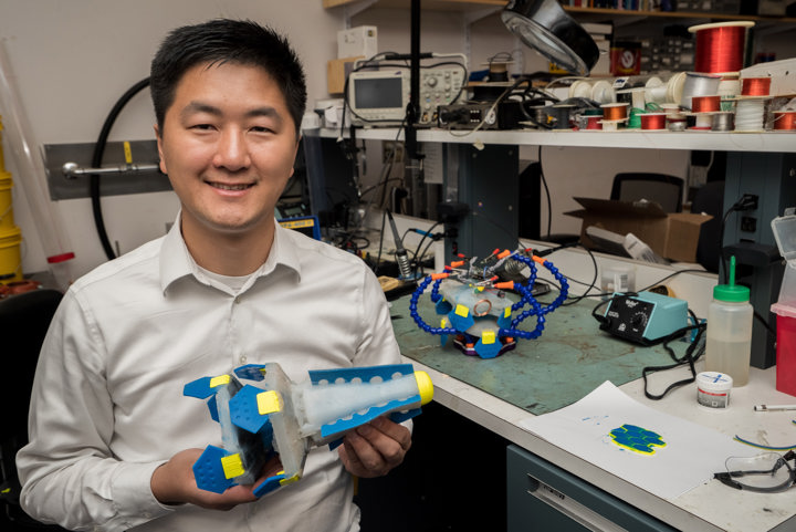 Image of You Wu with his prototype of Lighthouse